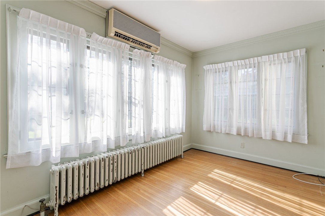 581 Claybourne Road Brighton, NY 14618 - Photo 18 of 40 Light filled sunroom off of living room