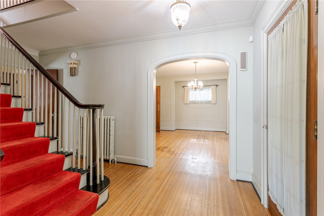 581 Claybourne Road Brighton, NY 14618 - Photo 7 of 40 Main foyer - wood floors throughout