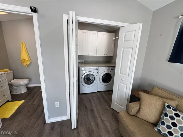 a view of a house with a yard and a garden