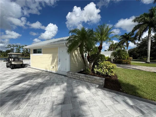 a view of a backyard of a house