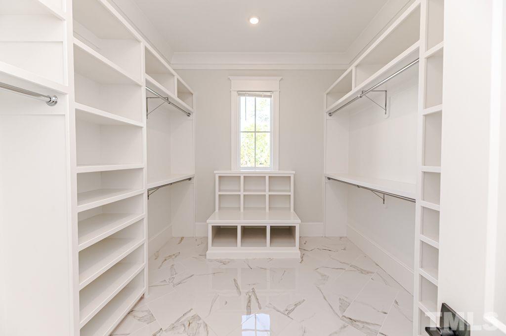 10822 Grand Journey Avenue Raleigh, NC 27614 - Photo 23 of 41 a view of a room with shelf and shelf