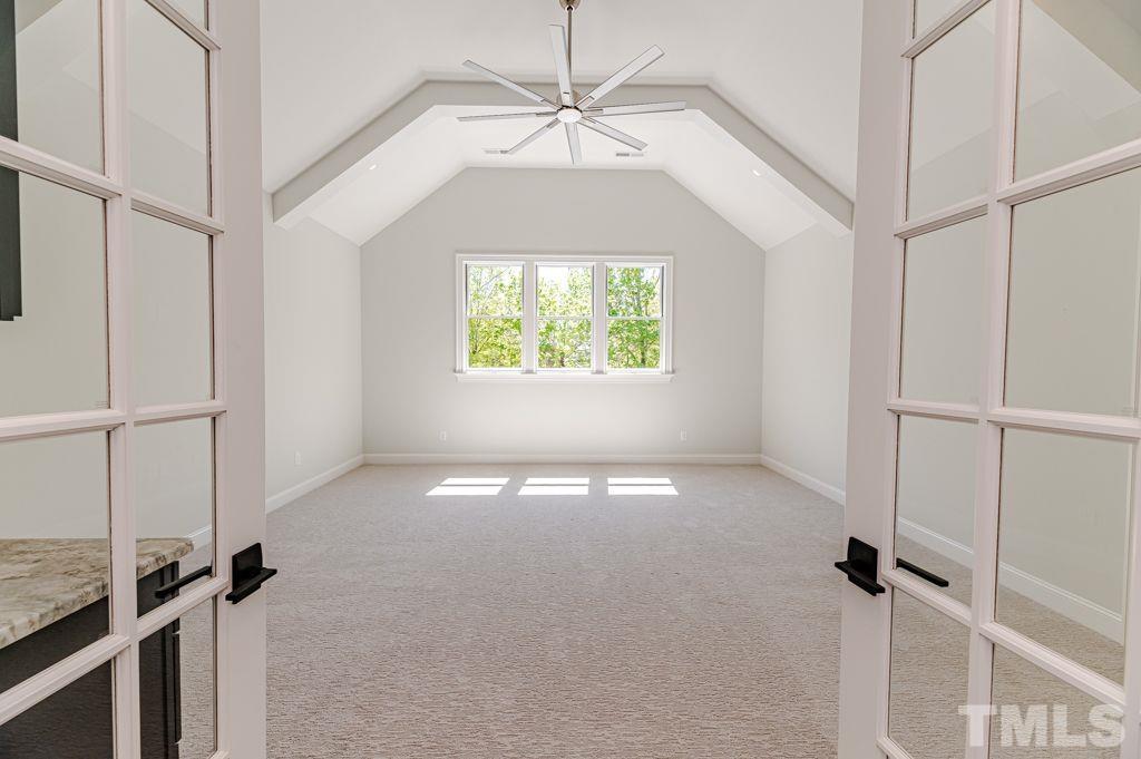 10822 Grand Journey Avenue Raleigh, NC 27614 - Photo 32 of 41 a view of a hallway with a window