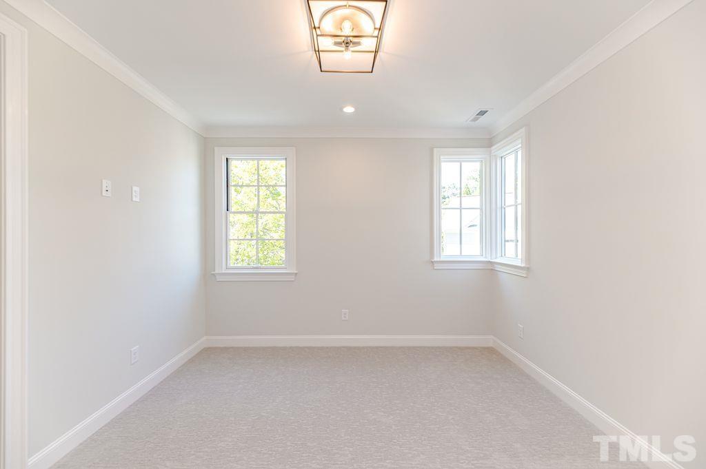10822 Grand Journey Avenue Raleigh, NC 27614 - Photo 35 of 41 an empty room with windows