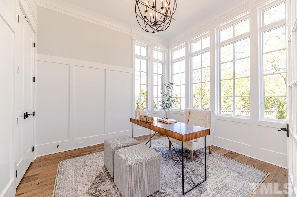 10822 Grand Journey Avenue Raleigh, NC 27614 - Photo 5 of 41 a living room with furniture and a window