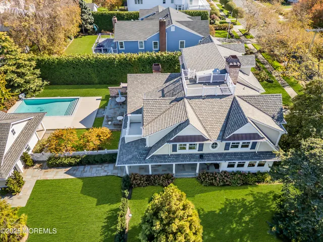 an aerial view of a house with a garden