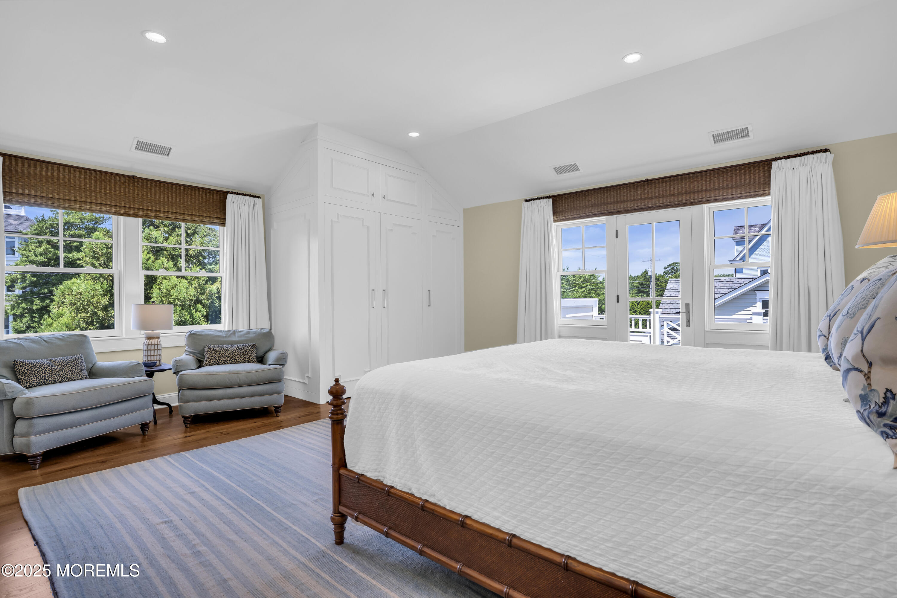 118 Warren Avenue Spring Lake, NJ 07762 - Photo 30 of 66 a bedroom with furniture and a large window