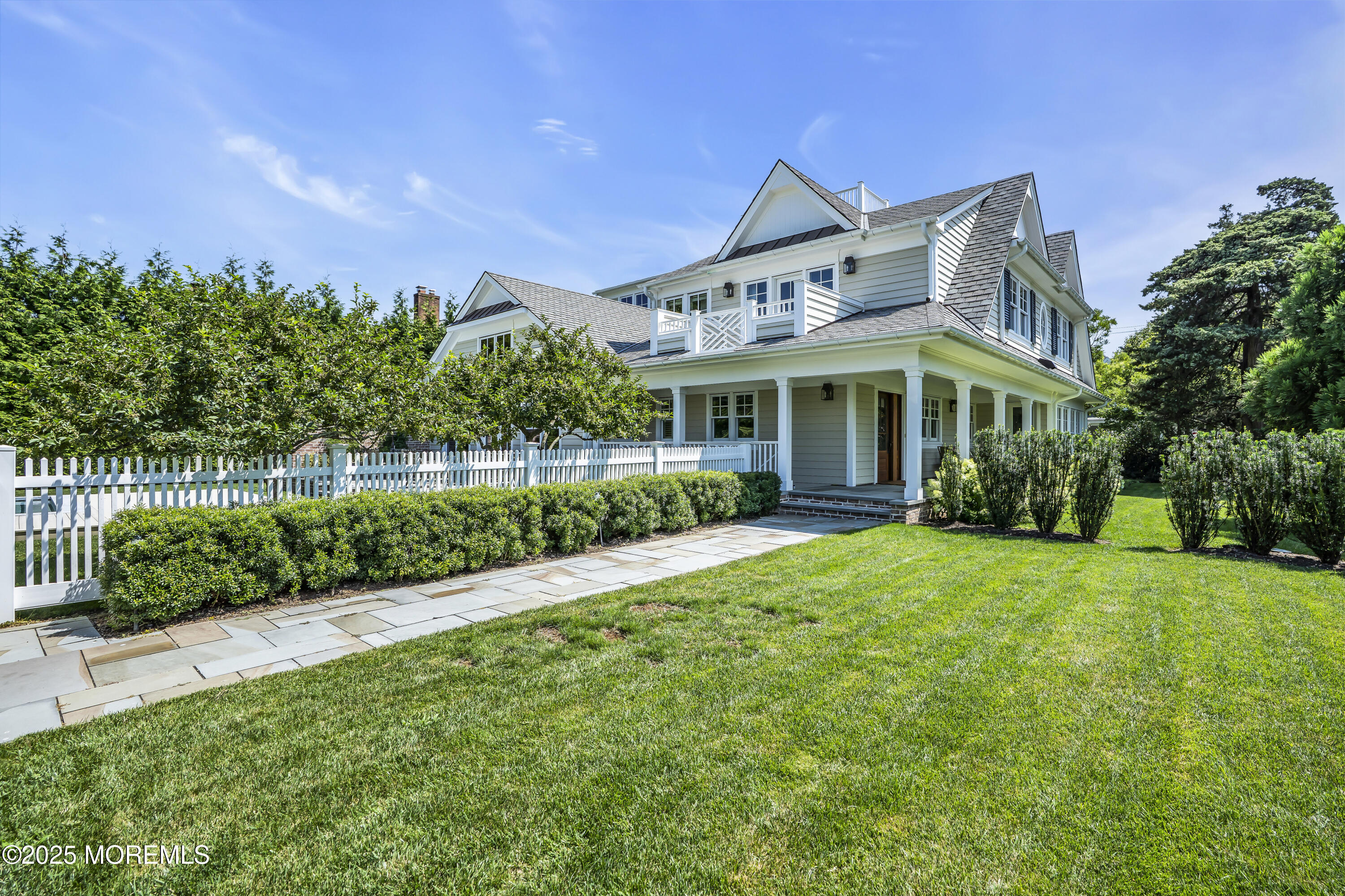 118 Warren Avenue Spring Lake, NJ 07762 - Photo 54 of 66 a front view of a house with a yard and green space