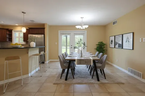 a view of a dining room with furniture