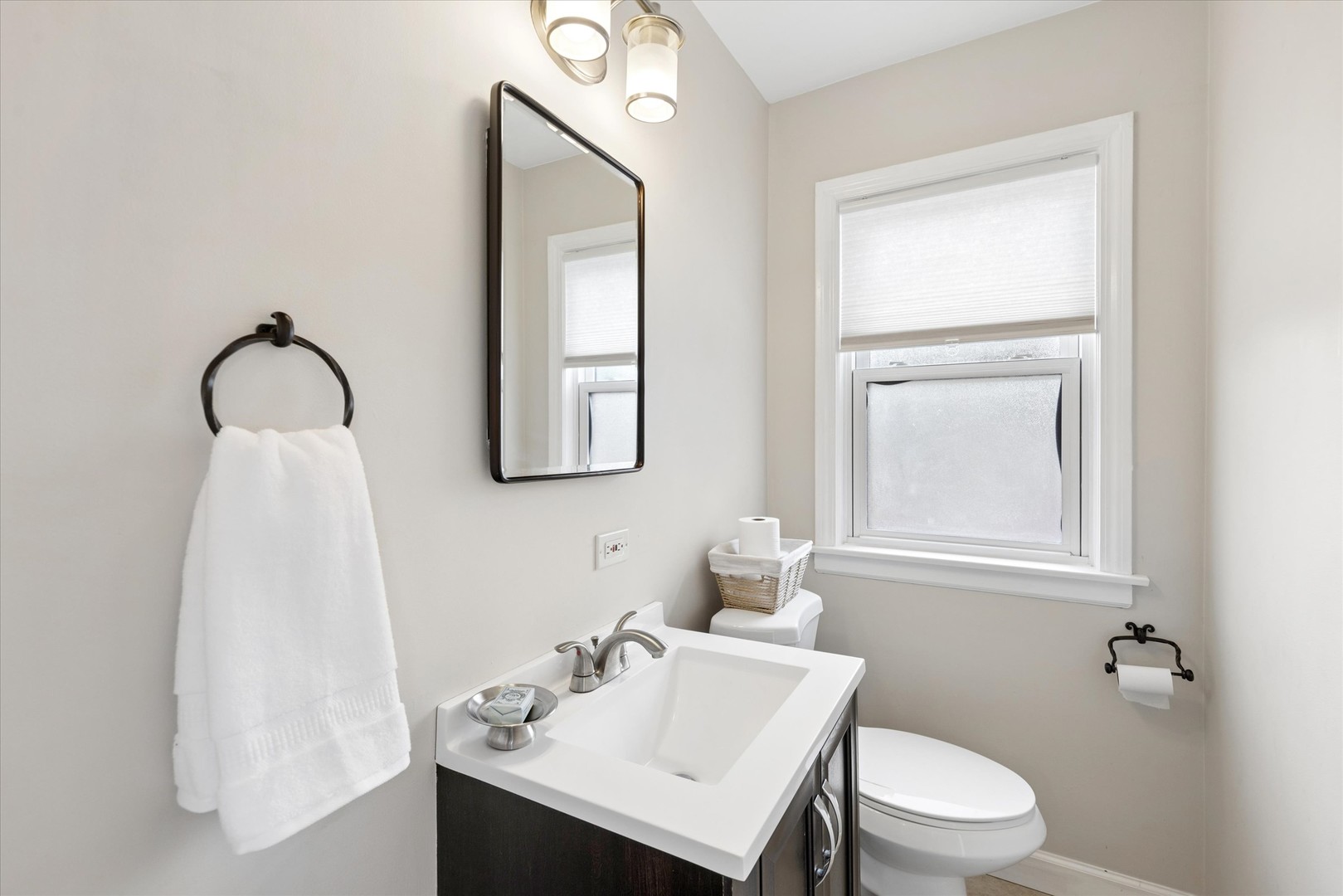 842 Forest Road La Grange Park, IL 60526 - Photo 14 of 21 a bathroom with a sink vanity mirror and toilet