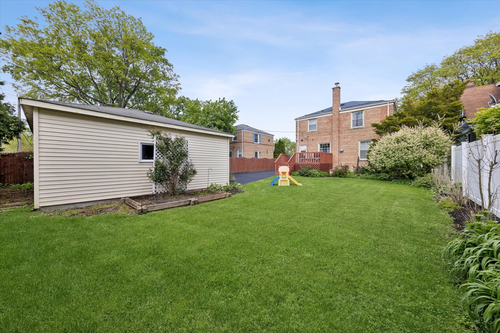 842 Forest Road La Grange Park, IL 60526 - Photo 17 of 21 a view of a backyard with plants and a backyard