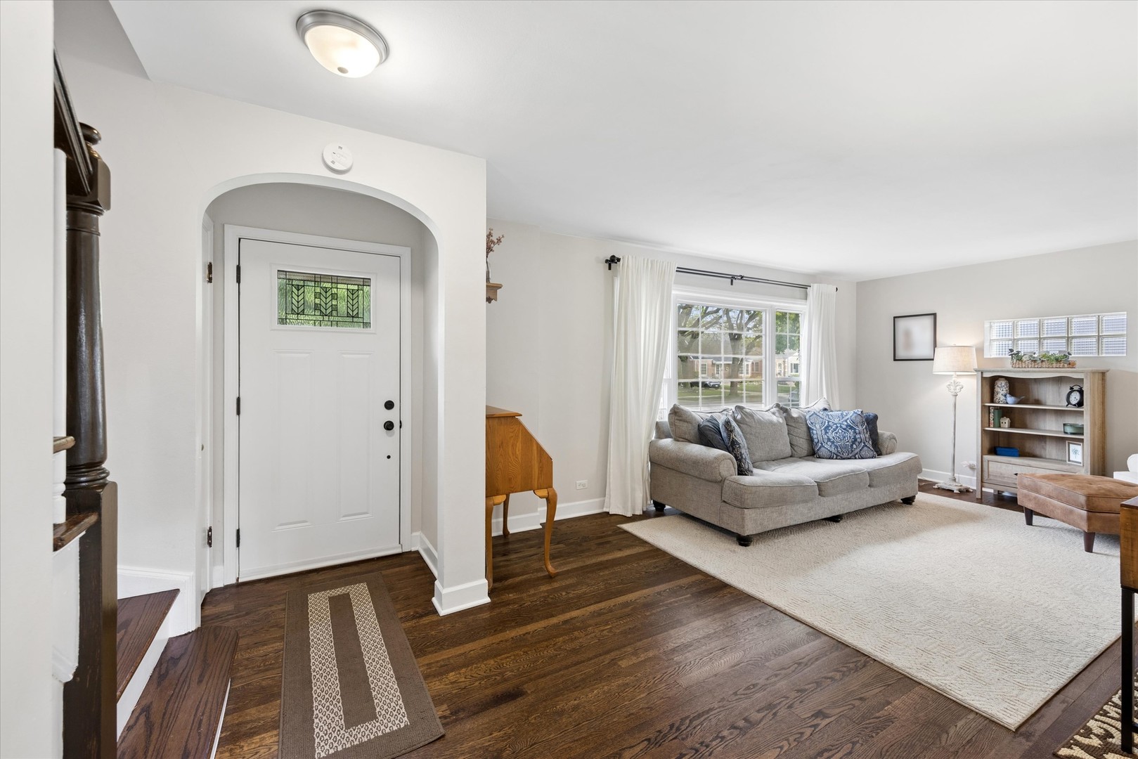 842 Forest Road La Grange Park, IL 60526 - Photo 2 of 21 a living room with furniture and a fireplace