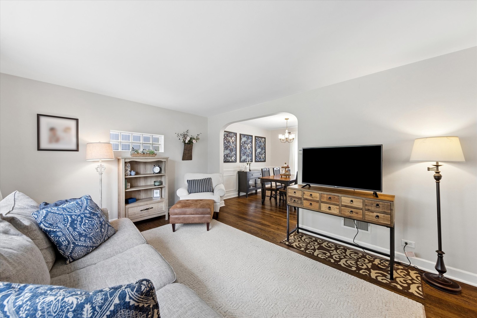 842 Forest Road La Grange Park, IL 60526 - Photo 3 of 21 a living room with furniture and a flat screen tv