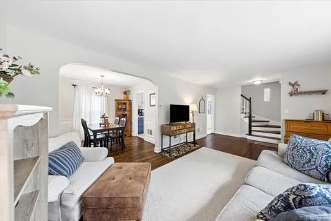 a living room with furniture and a table