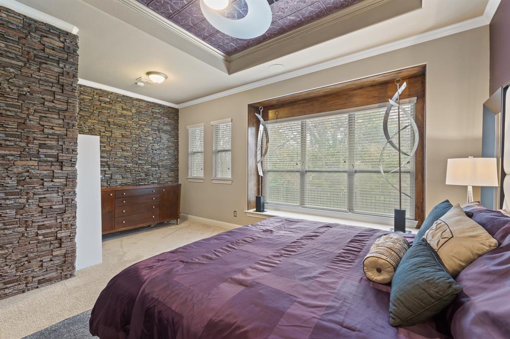 4711 Taylor Lane Grapevine, TX 76051 - Photo 15 of 31 a bedroom with a bed and a large window