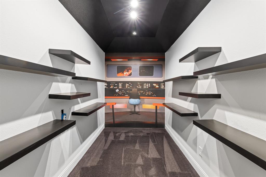 4711 Taylor Lane Grapevine, TX 76051 - Photo 24 of 31 a kitchen with stainless steel appliances granite countertop a sink and a stove