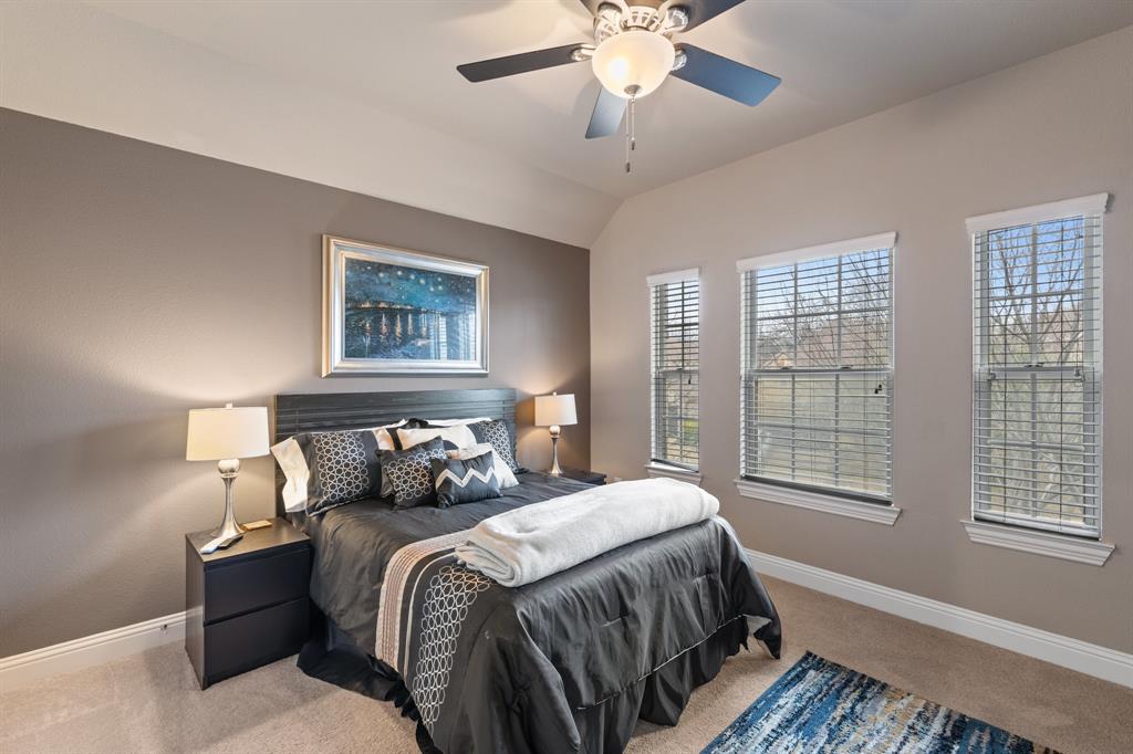 4711 Taylor Lane Grapevine, TX 76051 - Photo 25 of 31 a bedroom with bed and a window