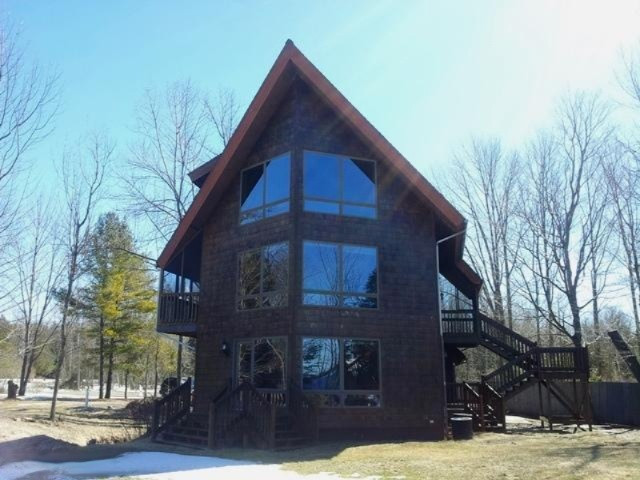 6414 Lakeshore Road Manistee, MI 49660 - Photo 1 of 23 Primary Photo