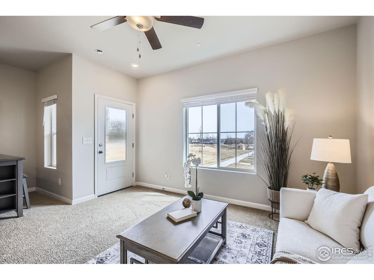 141 Robin Road Johnstown, CO 80534 - Photo 6 of 38 Front Living Room