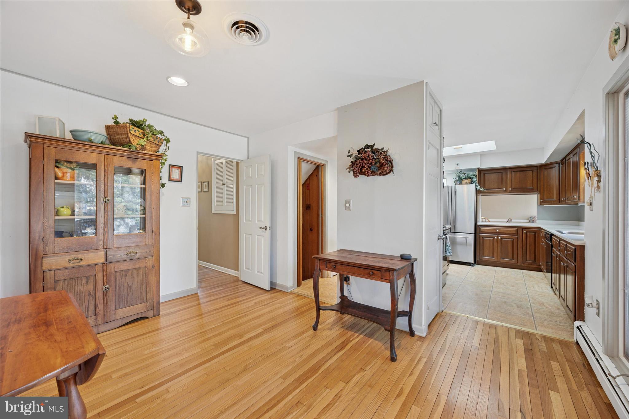 1111 Hagues Mill Road Ambler, PA 19002 - Photo 13 of 31 a view of a livingroom with furniture and wooden floor