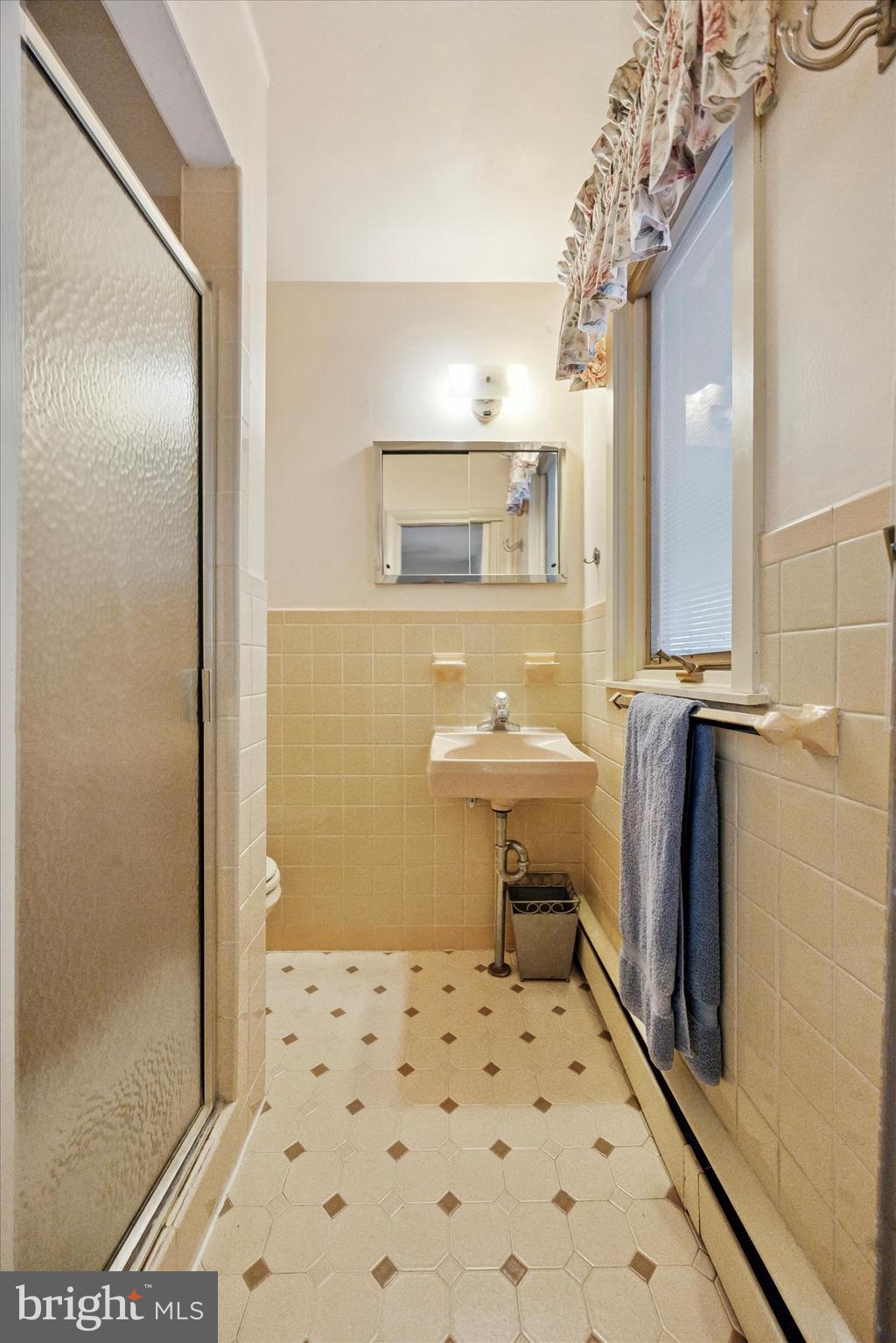 1111 Hagues Mill Road Ambler, PA 19002 - Photo 16 of 31 a bathroom with a sink toilet and shower