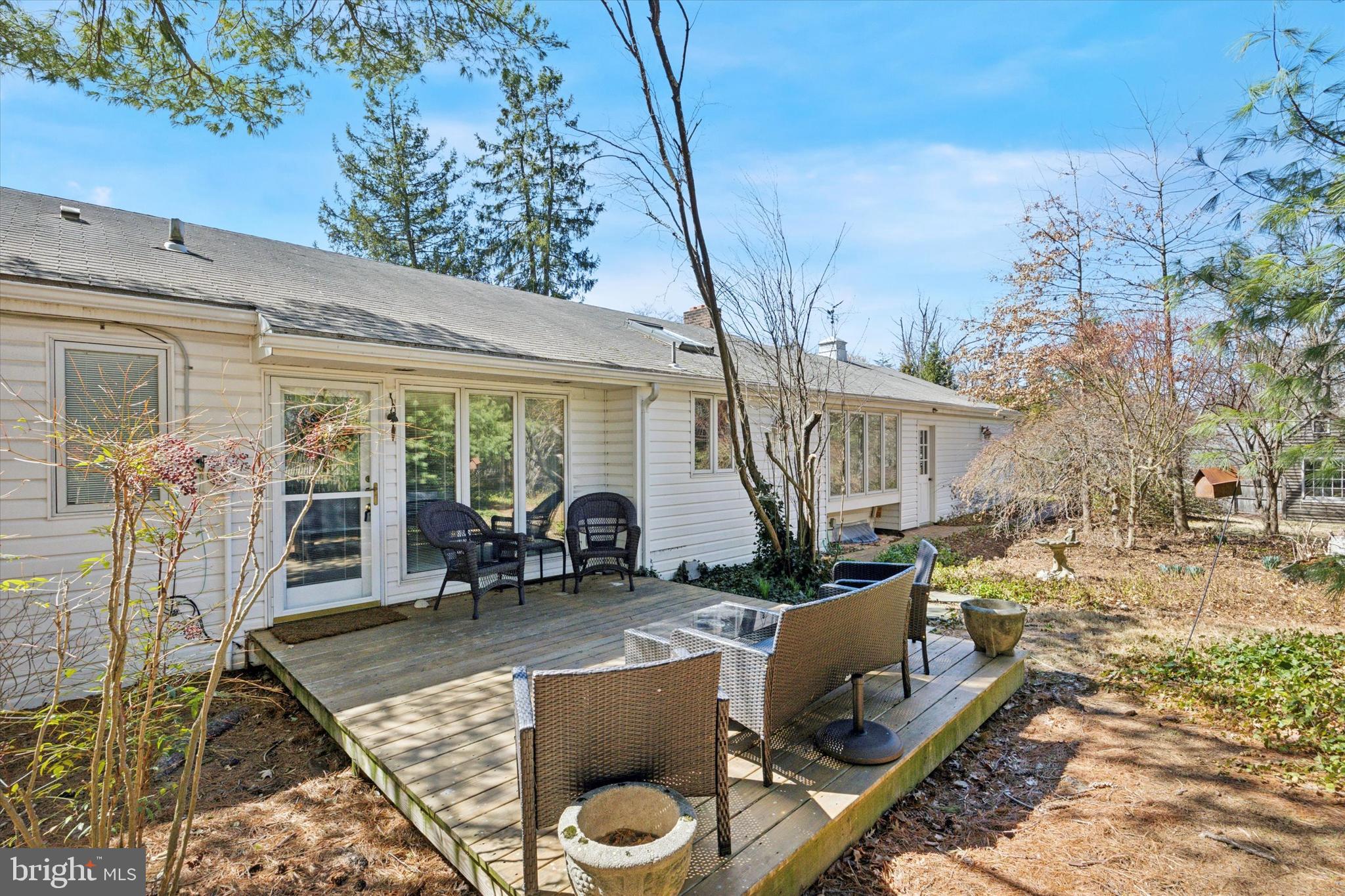 1111 Hagues Mill Road Ambler, PA 19002 - Photo 23 of 31 a view of a house with backyard and sitting area