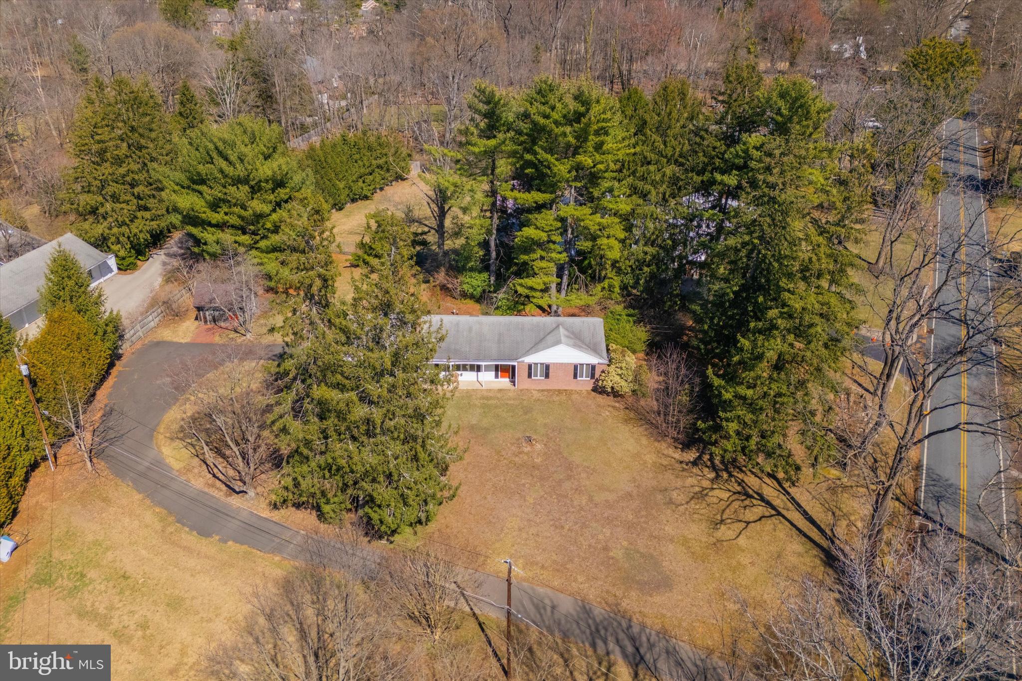 1111 Hagues Mill Road Ambler, PA 19002 - Photo 29 of 31 an aerial view of a house with a yard and mountain view