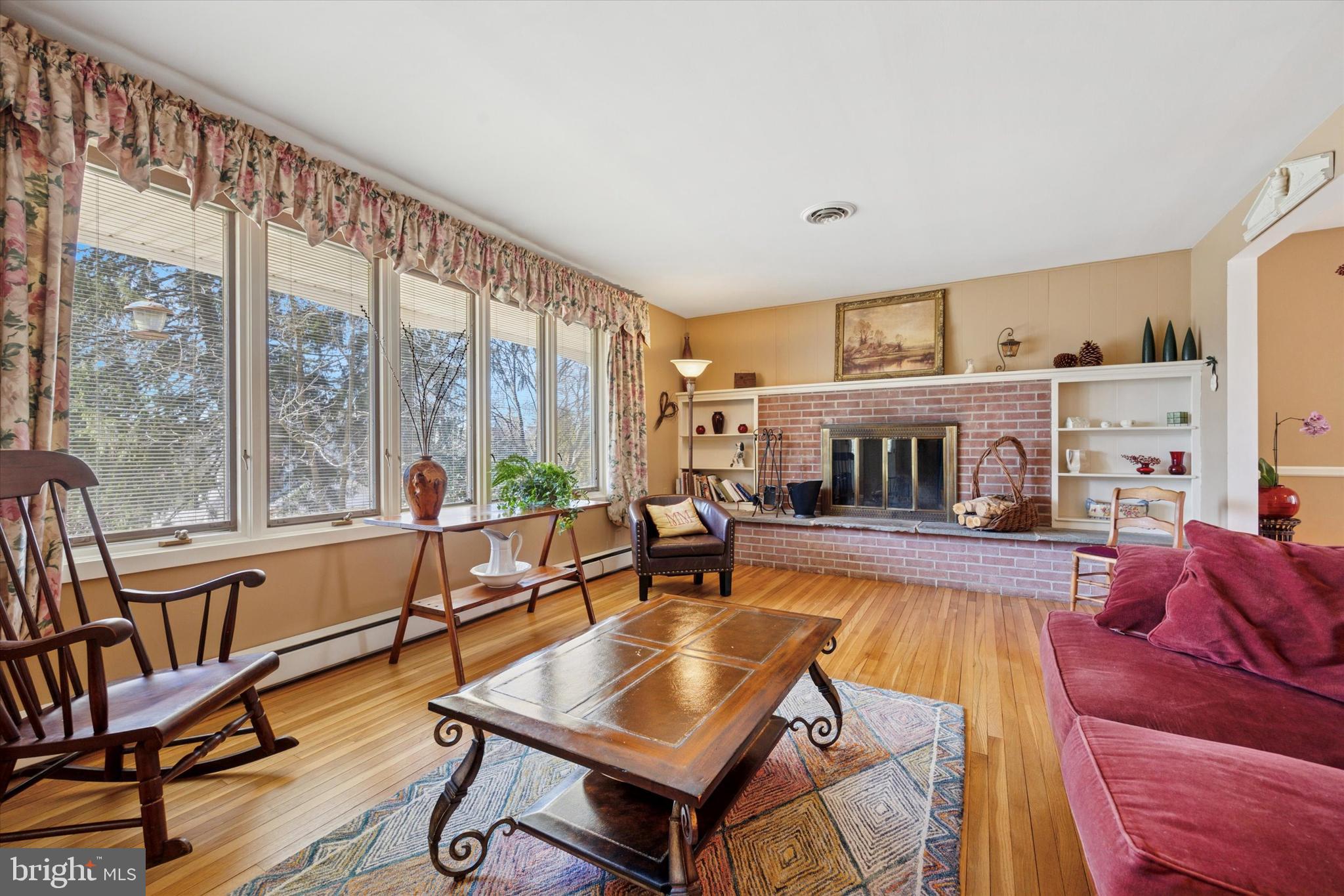 1111 Hagues Mill Road Ambler, PA 19002 - Photo 4 of 31 a living room with furniture and a large window