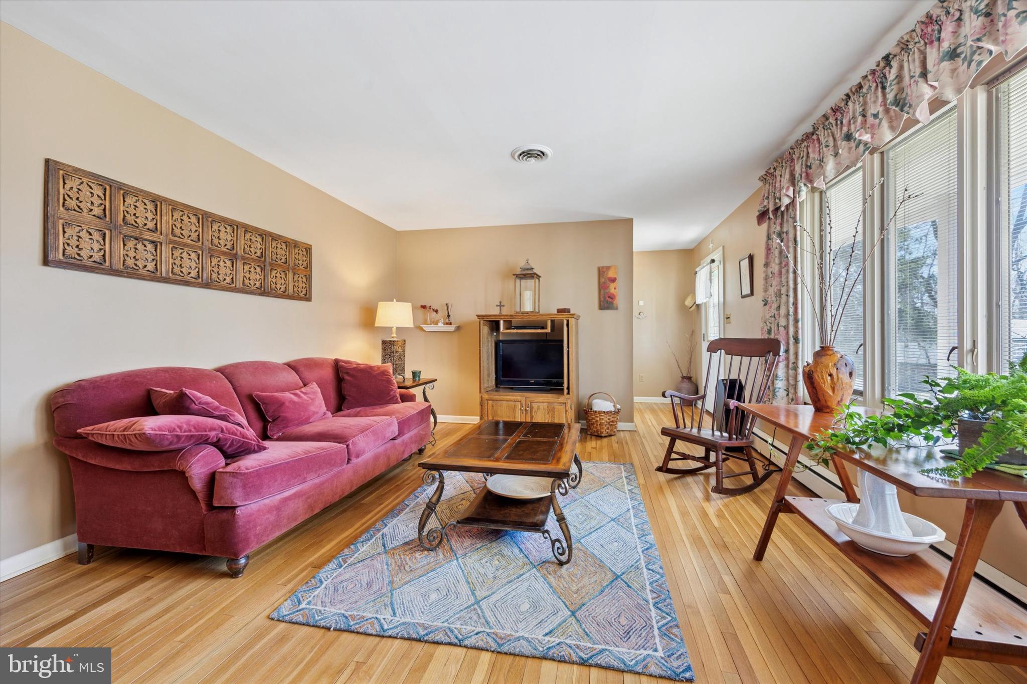 1111 Hagues Mill Road Ambler, PA 19002 - Photo 5 of 31 a living room with furniture and a flat screen tv