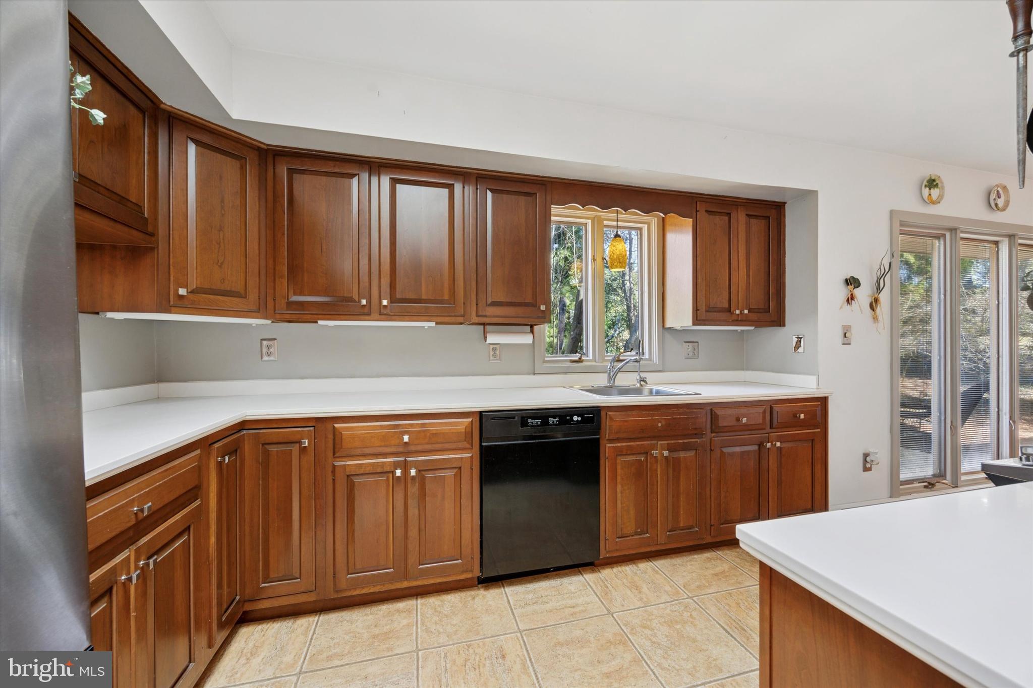 1111 Hagues Mill Road Ambler, PA 19002 - Photo 10 of 31 a kitchen with a sink stove and cabinets