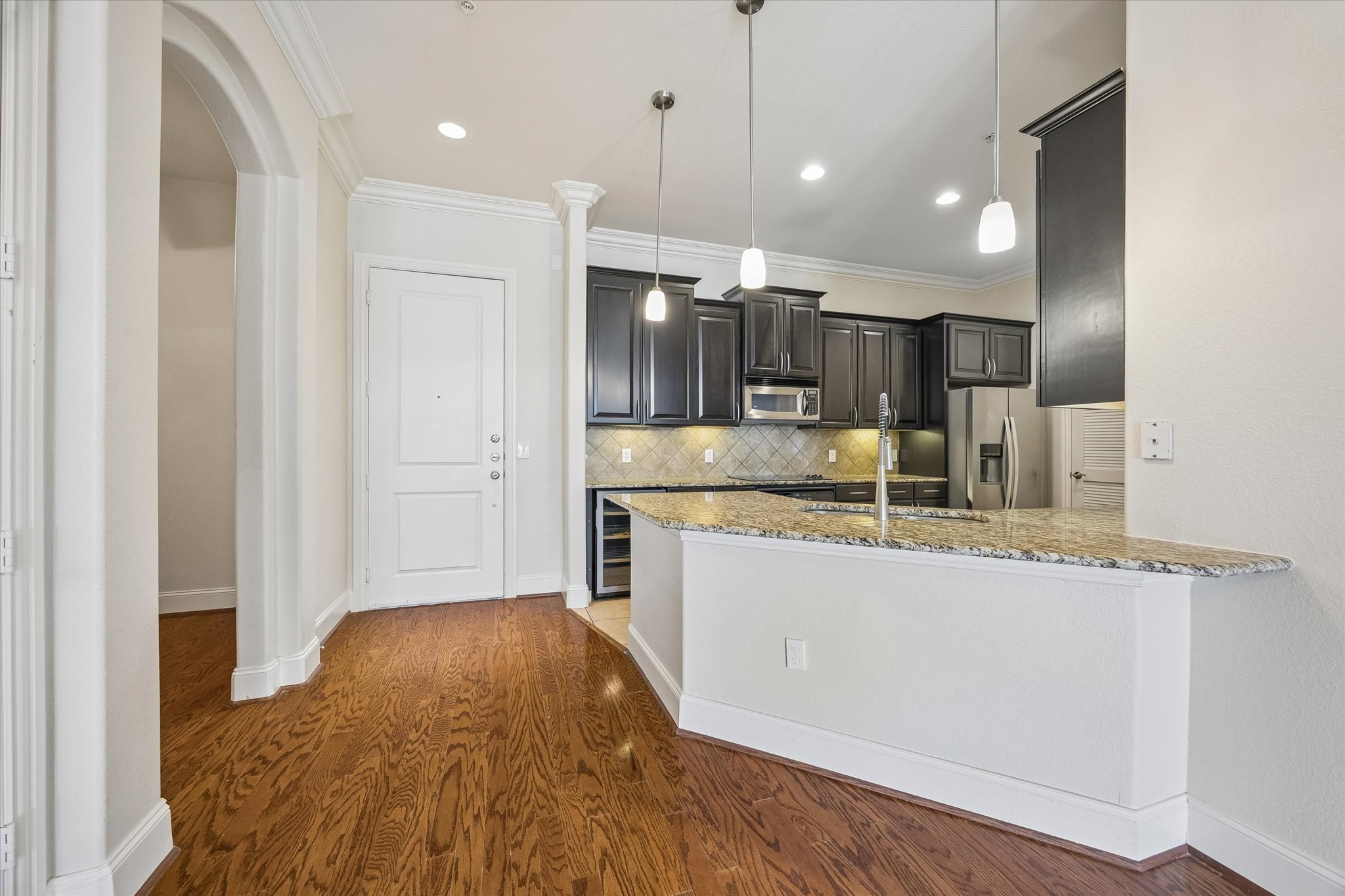 2120 Kipling Street, Unit 207 Houston, TX 77098 - Photo 9 of 35 To the left of the kitchen is the dedicated office space