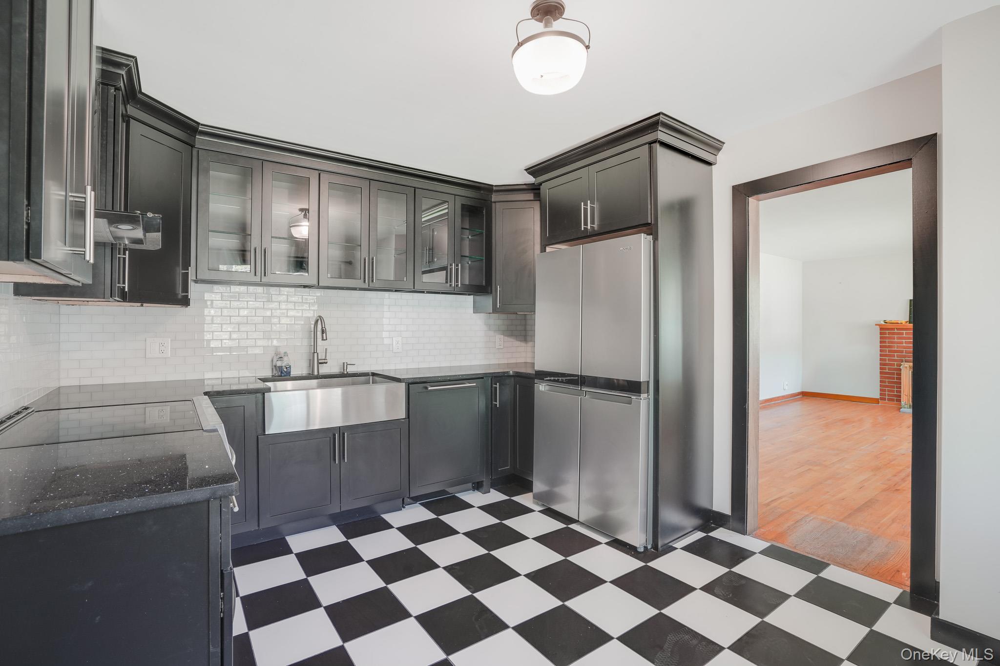84 Sleight-Plass Road Poughkeepsie, NY 12603 - Photo 14 of 30 a kitchen with granite countertop a refrigerator and a sink