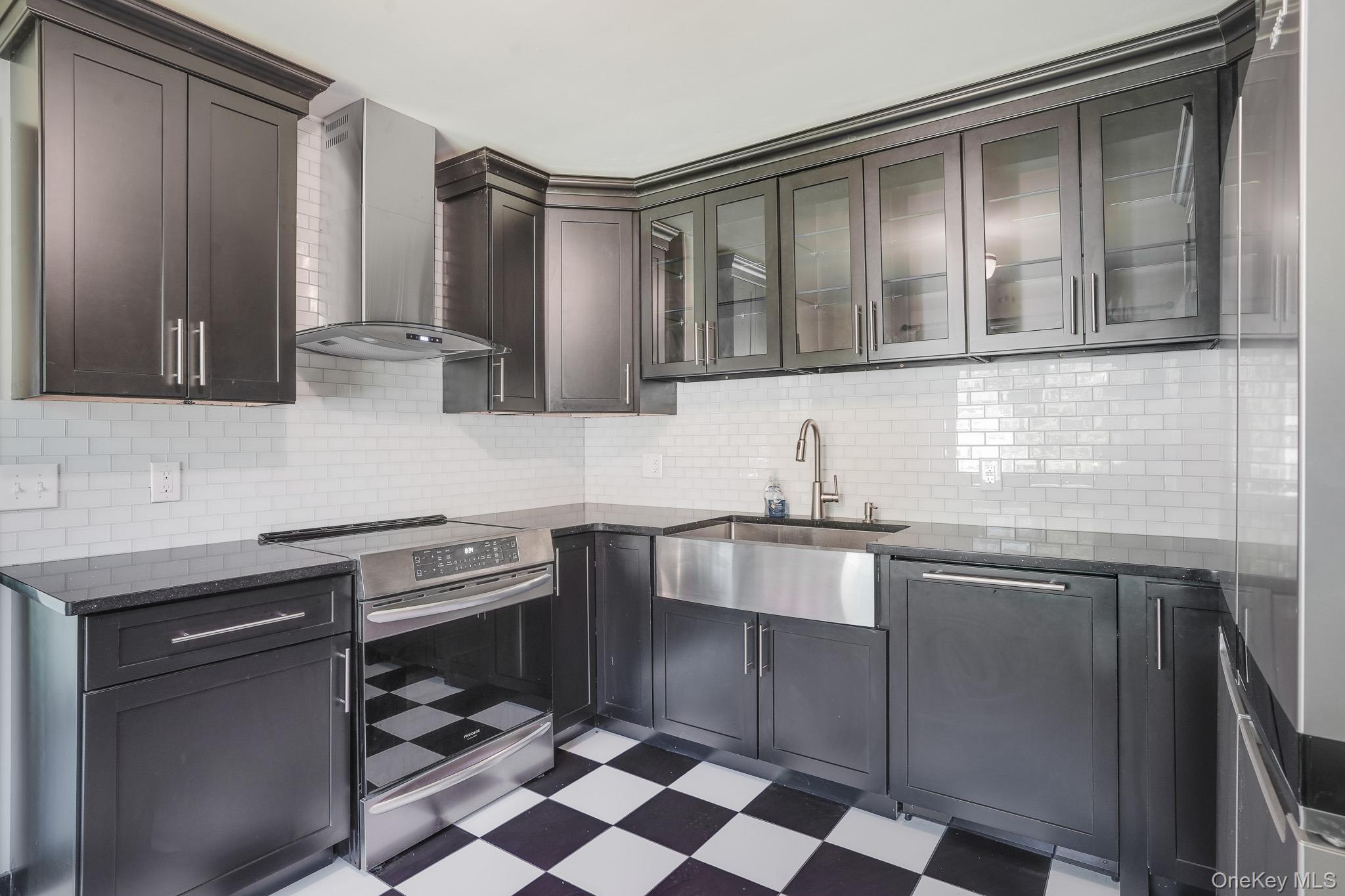 84 Sleight-Plass Road Poughkeepsie, NY 12603 - Photo 15 of 30 a kitchen with stainless steel appliances granite countertop a sink and cabinets