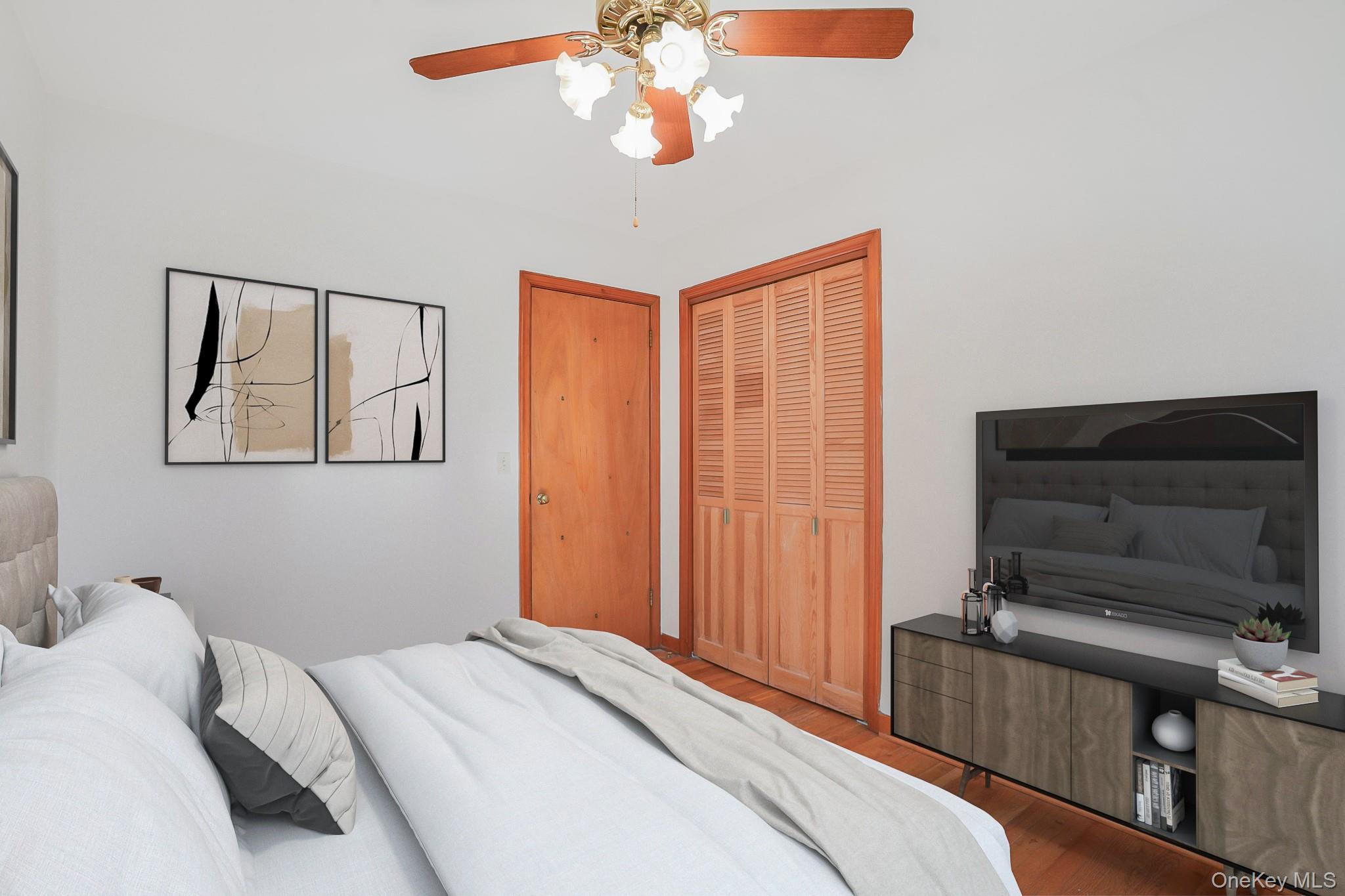 84 Sleight-Plass Road Poughkeepsie, NY 12603 - Photo 18 of 30 a bedroom with a bed and a chandelier