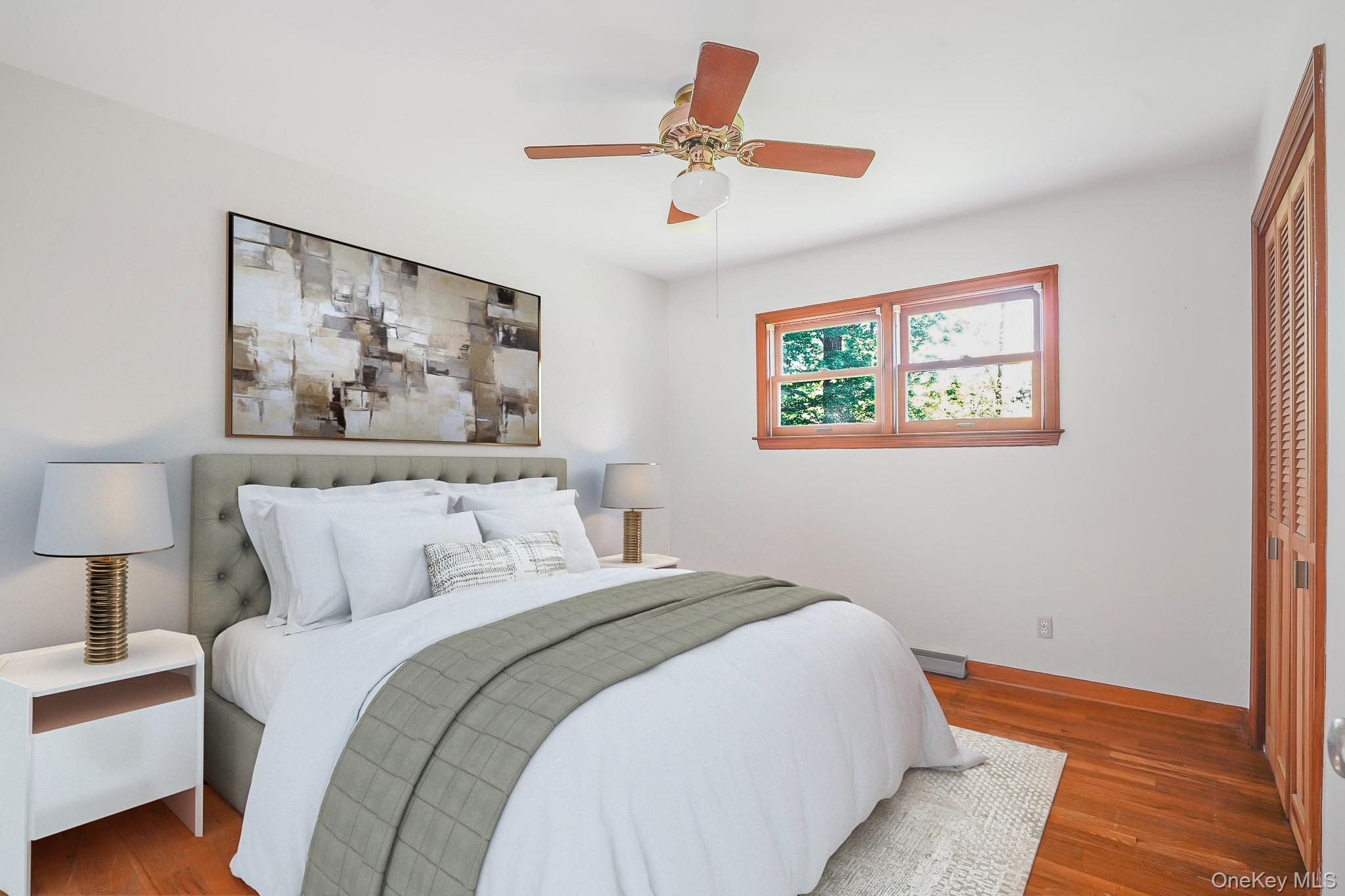 84 Sleight-Plass Road Poughkeepsie, NY 12603 - Photo 19 of 30 a bedroom with bed and painting on the wall