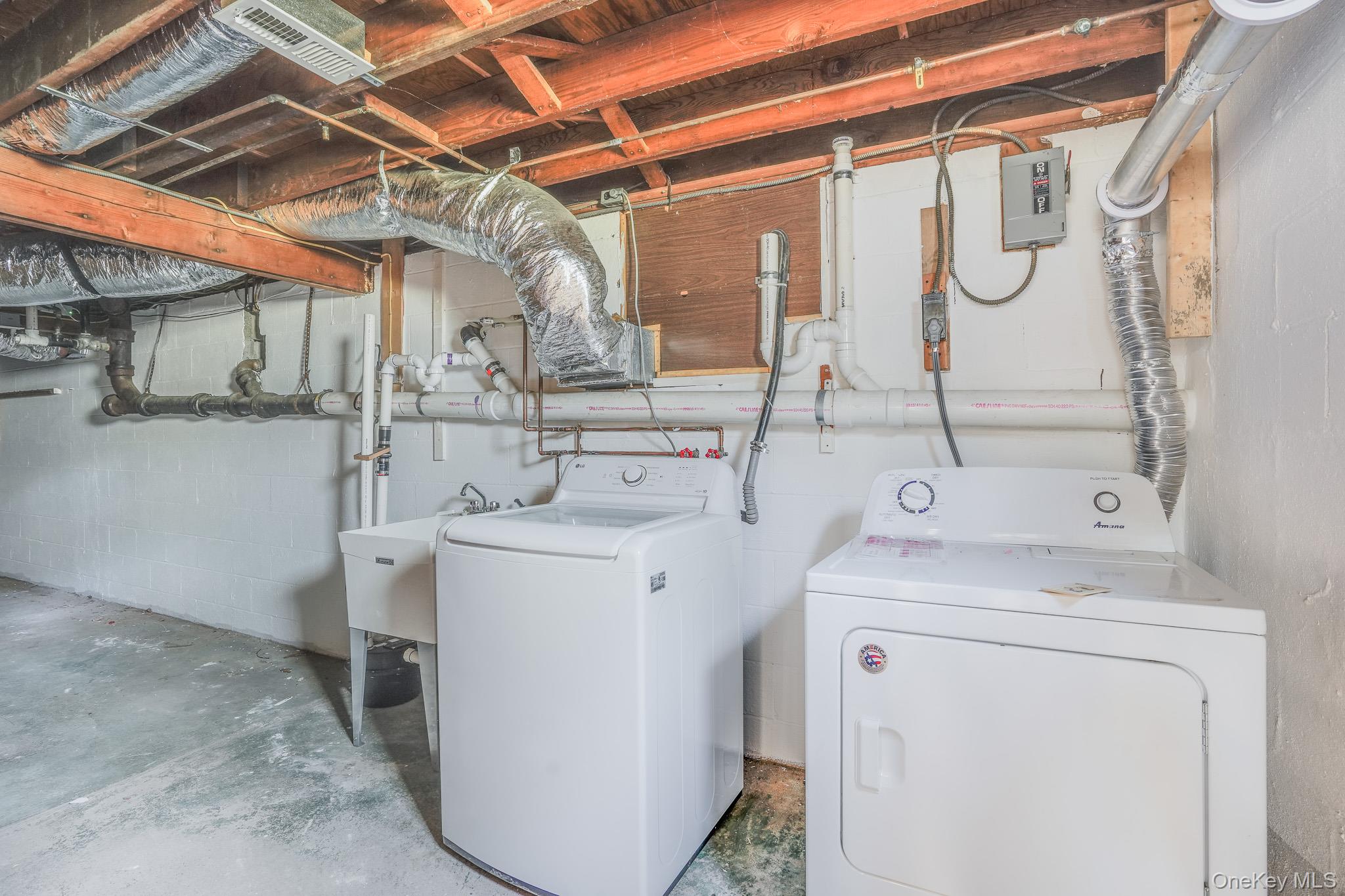 84 Sleight-Plass Road Poughkeepsie, NY 12603 - Photo 25 of 30 a utility room with dryer and washer