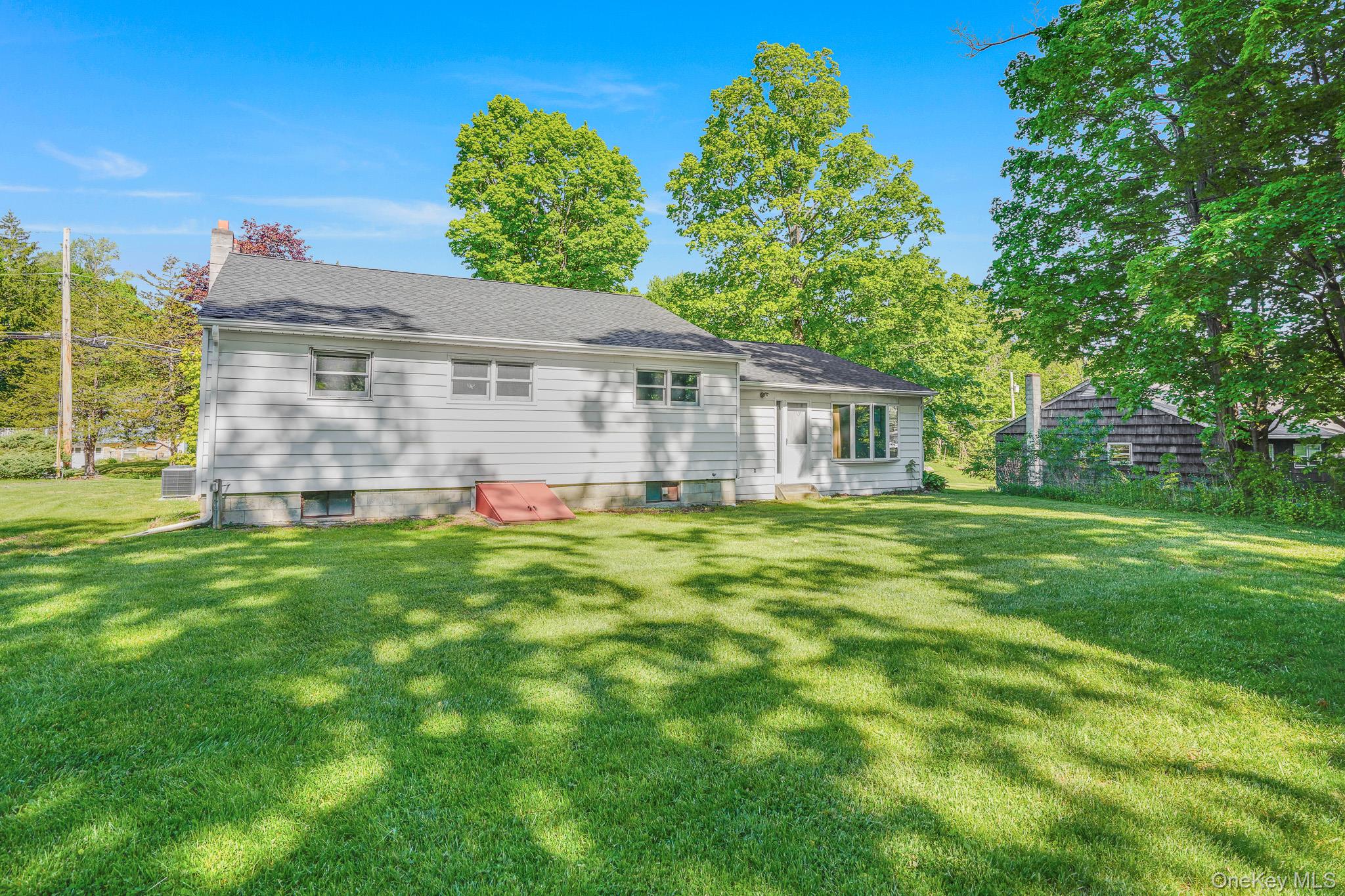 84 Sleight-Plass Road Poughkeepsie, NY 12603 - Photo 26 of 30 a view of a house with a backyard