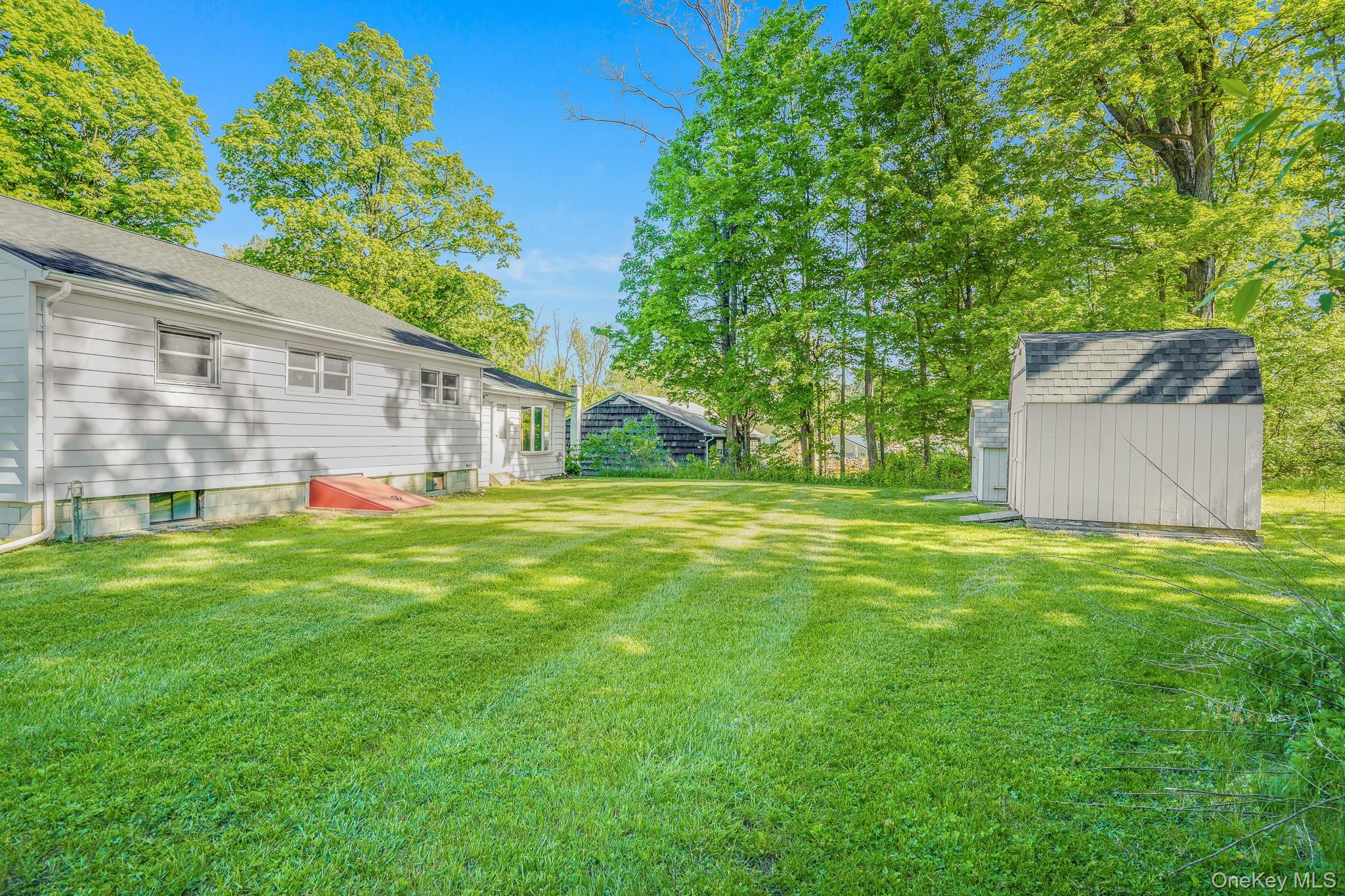 84 Sleight-Plass Road Poughkeepsie, NY 12603 - Photo 27 of 30 a view of a house with a yard