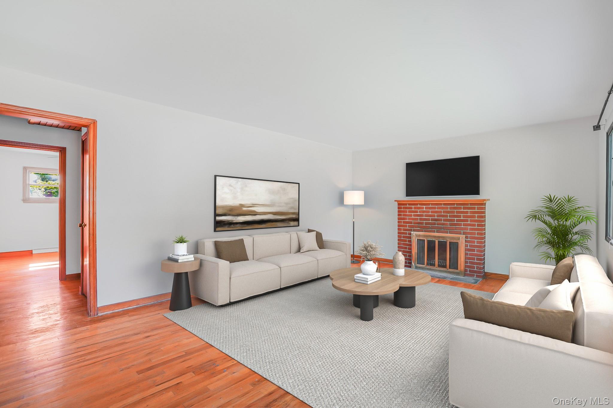 84 Sleight-Plass Road Poughkeepsie, NY 12603 - Photo 8 of 30 a living room with furniture a fireplace and a flat screen tv
