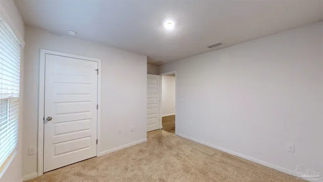 an empty room with closet