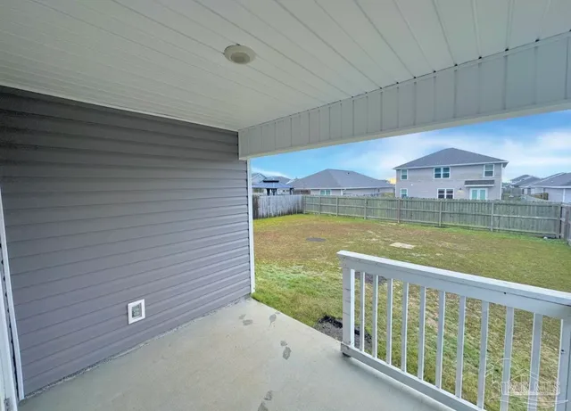 a view of a balcony with an ocean view