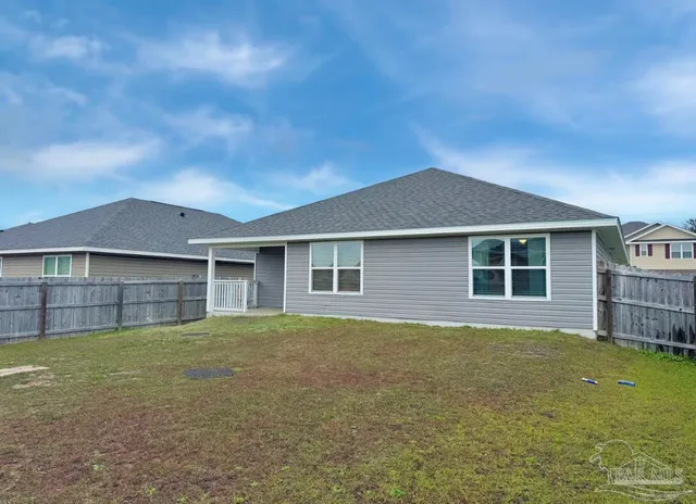a house view with a garden space