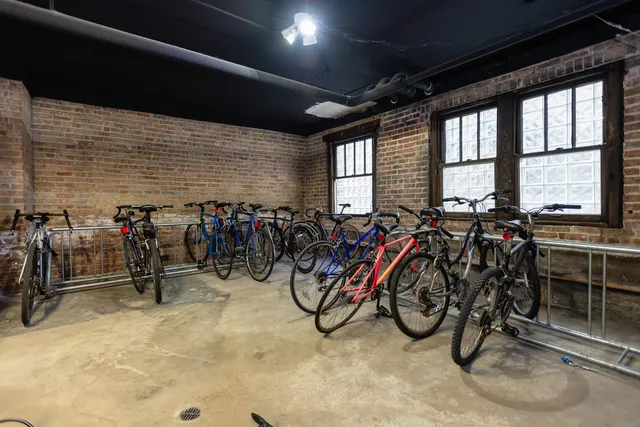 an outdoor space with lots of gym equipment