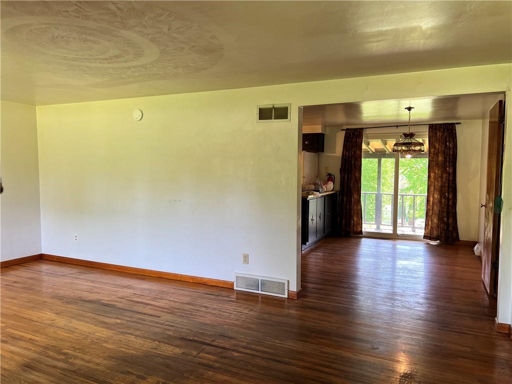 880 Pizza Barn Road Blairsville, PA 15717 - Photo 20 of 44 a view of a room with wooden floor and a window