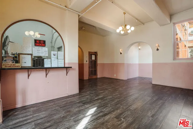 a view of a kitchen with a dishwasher and cabinets