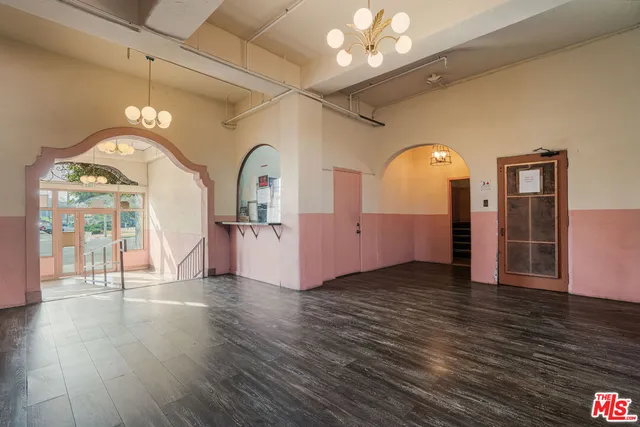 a view of a livingroom with wooden floor