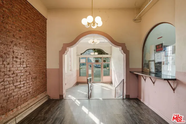 a view of a living room with a large window