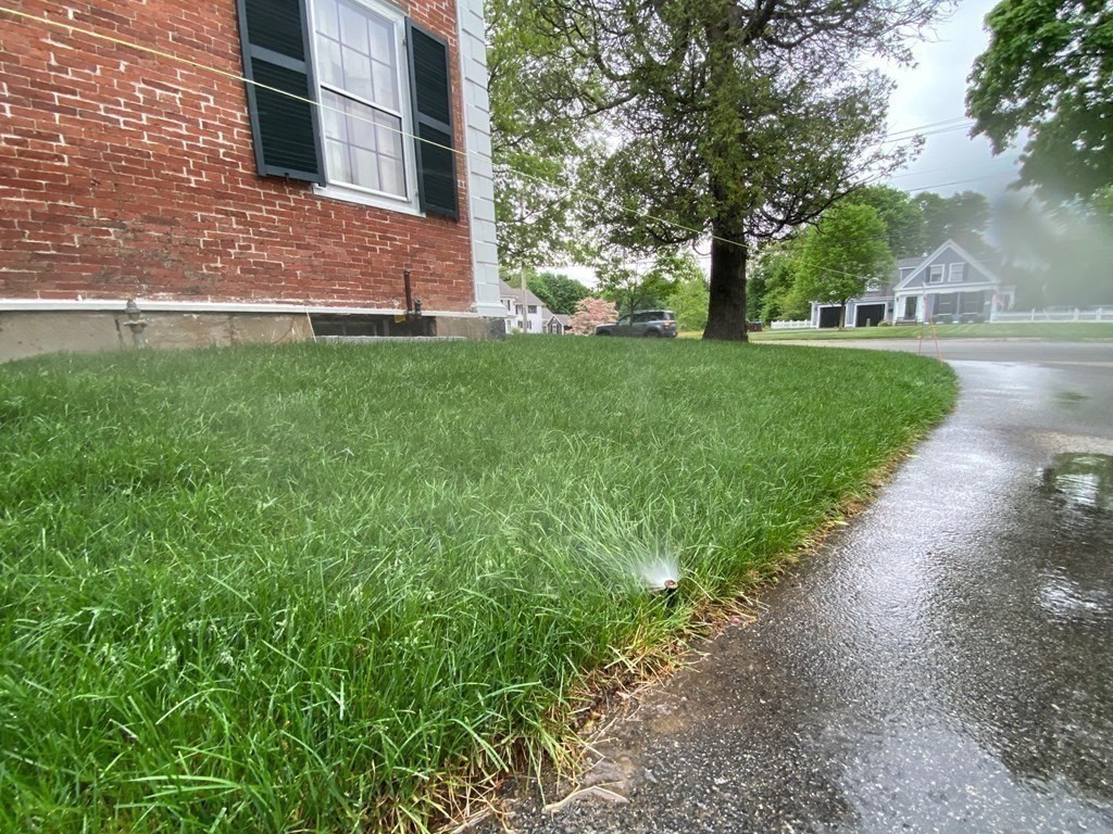413 Main Street Hingham, MA 02043 - Photo 24 of 33 a view of a house with a yard
