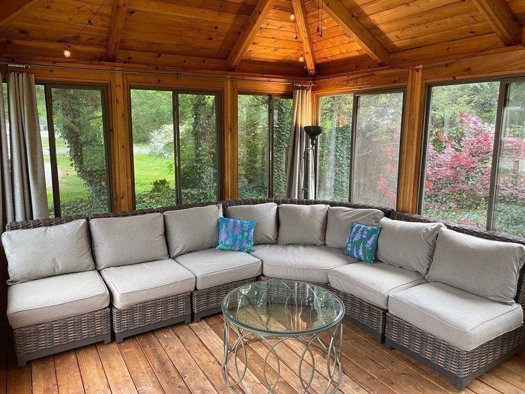 413 Main Street Hingham, MA 02043 - Photo 7 of 33 a living room with furniture and a large window