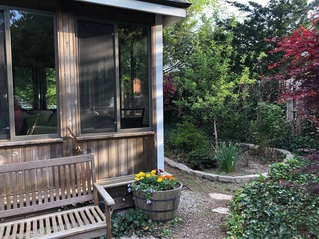413 Main Street Hingham, MA 02043 - Photo 8 of 33 a view of a porch with a chair