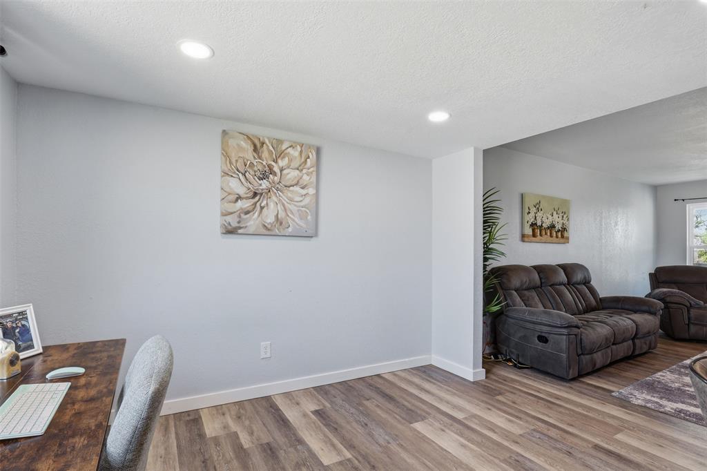 1865 Old Denton Highway Decatur, TX 76234 - Photo 12 of 35 a living room with furniture and a wooden floor